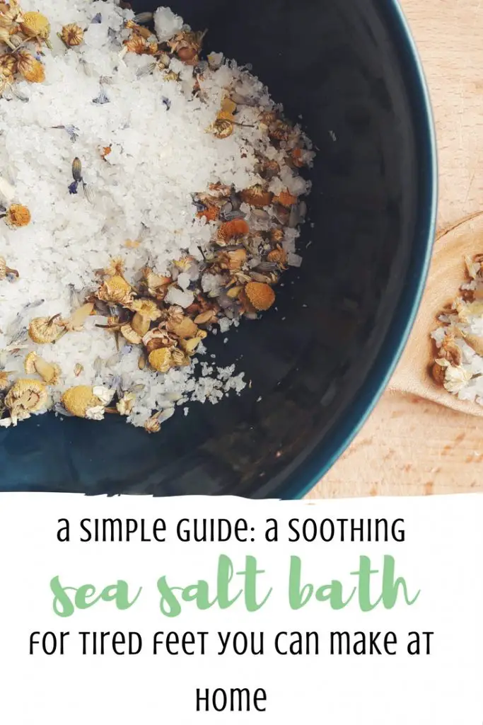 Soothing homemade sea salt bath for tired feet with dried flowers and essential oils